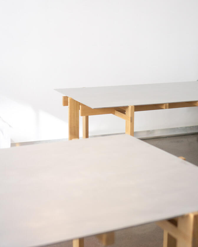 alu studio desk a desk made of solid european cherry wood with a surface of handbrushed aluminium designed by Liam Barwick