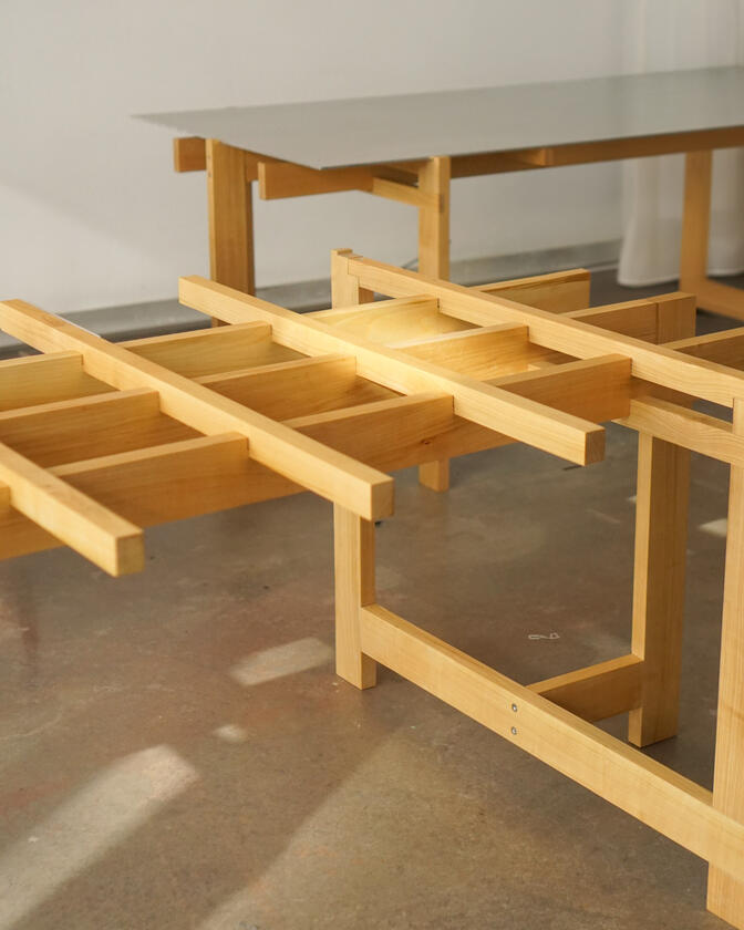 alu studio desk a desk made of solid european cherry wood with a surface of handbrushed aluminium designed by Liam Barwick
