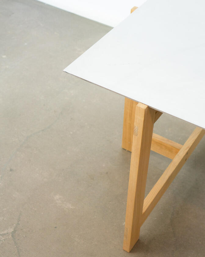 alu studio desk a desk made of solid european cherry wood with a surface of handbrushed aluminium designed by Liam Barwick