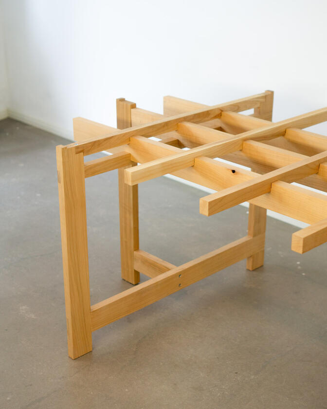 alu studio desk a desk made of solid european cherry wood with a surface of handbrushed aluminium designed by Liam Barwick