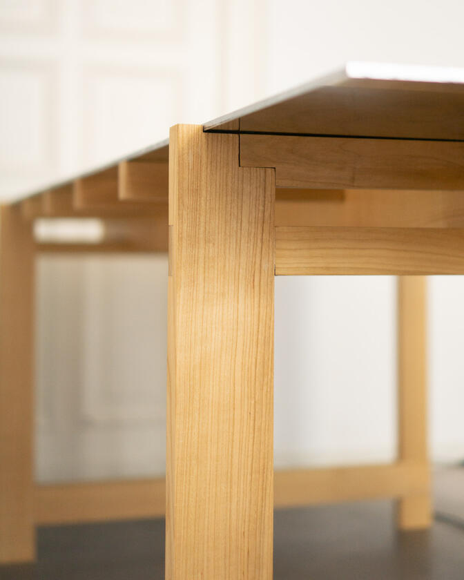 alu studio desk a desk made of solid european cherry wood with a surface of handbrushed aluminium designed by Liam Barwick