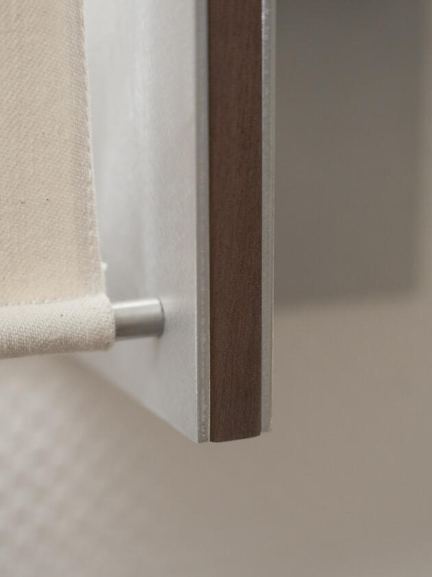 ritual lamp A wall lamp made of hand brushed aluminium with a strip of dark hardwood and a soft calico cover. Designed and made by Liam Barwick