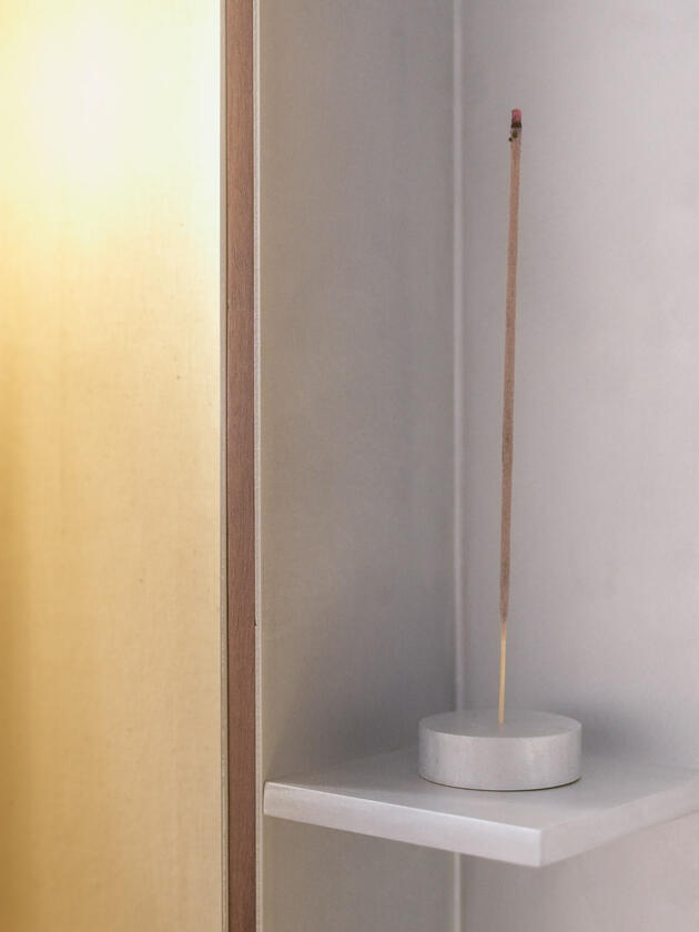 ritual lamp A wall lamp made of hand brushed aluminium with a strip of dark hardwood and a soft calico cover. Designed and made by Liam Barwick