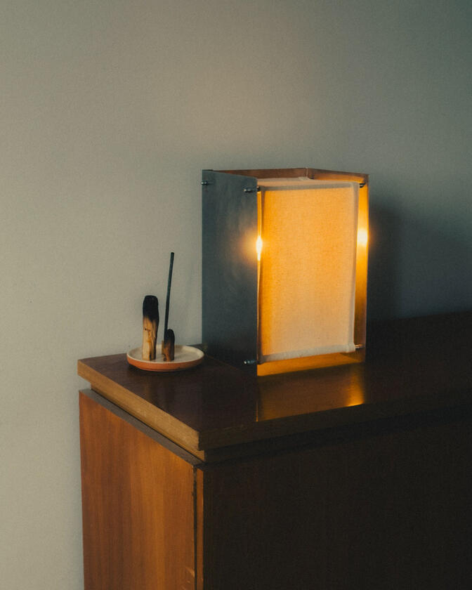 lamp 001 A table lamp constructed of a raw steel exterior and a soft organic cotton canvas diffuser. Designed and constructed by Liam Barwick