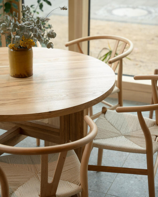 round table A large wooden round table 120cm in diameter made of solid ash wood. Designed and made by Liam Barwick