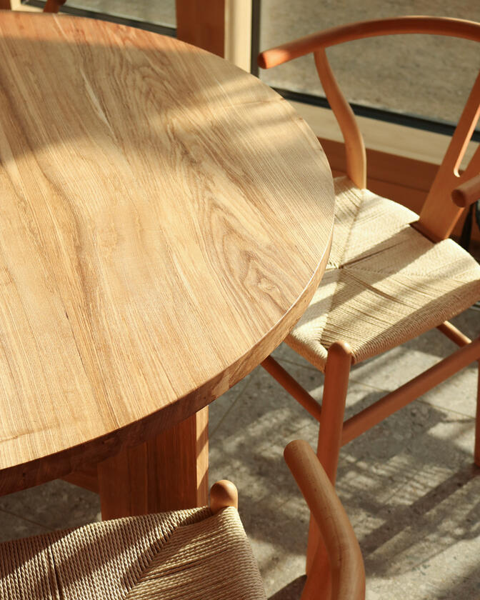 round table A large wooden round table 120cm in diameter made of solid ash wood. Designed and made by Liam Barwick