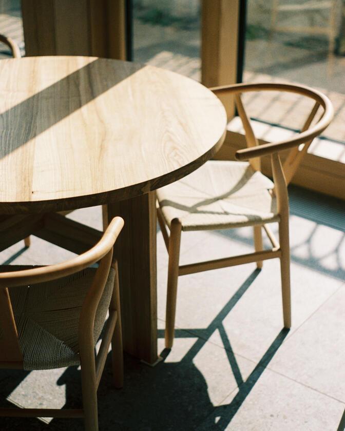 round table A large wooden round table 120cm in diameter made of solid ash wood. Designed and made by Liam Barwick