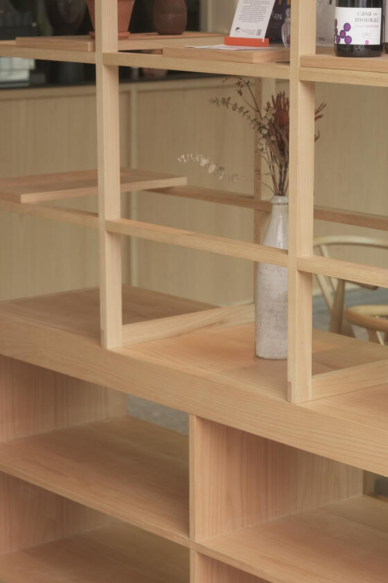 room divider A shelving unit and room divider made of beech wood designer and built by Liam Barwick