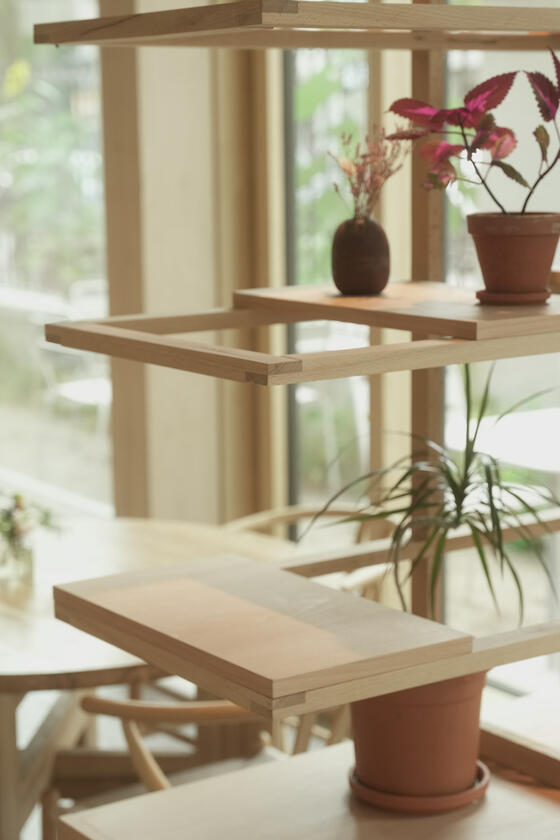 room divider A shelving unit and room divider made of beech wood designer and built by Liam Barwick