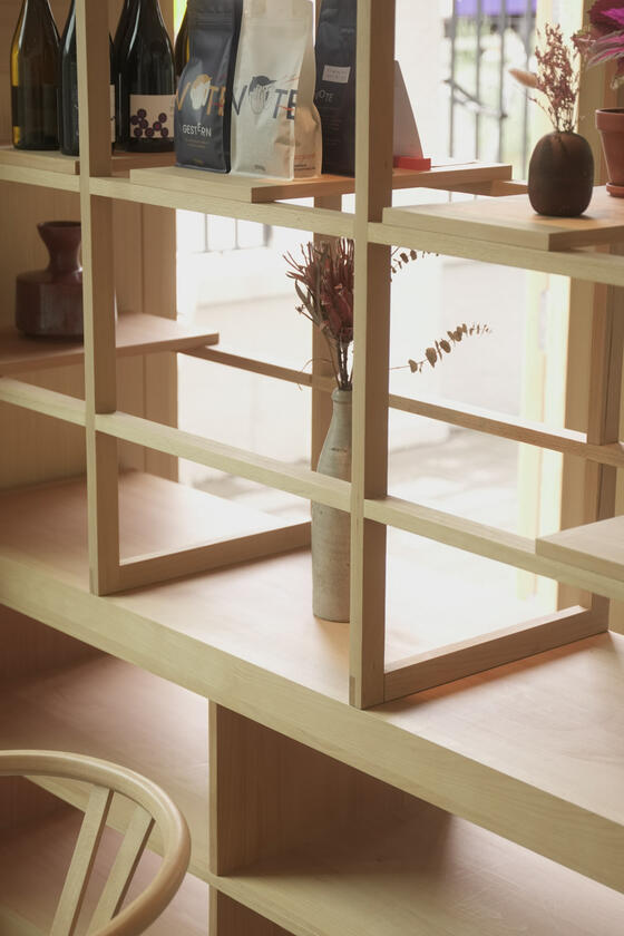 room divider A shelving unit and room divider made of beech wood designer and built by Liam Barwick